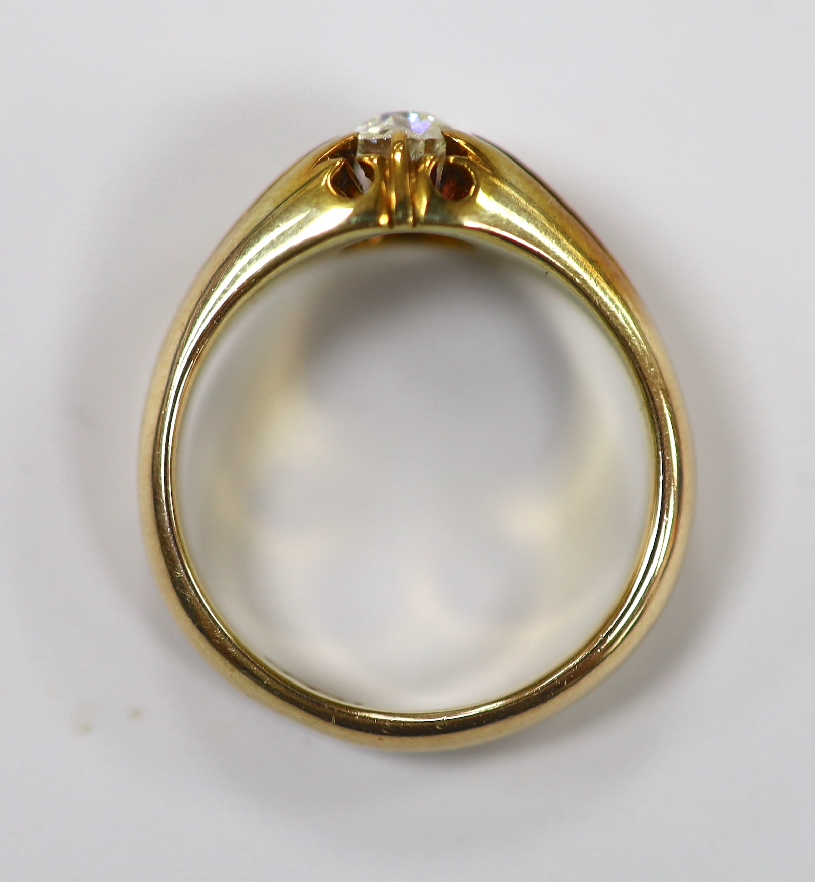 An early 20th century 18ct and claw set solitaire diamond ring, size P, gross weight 7.2 grams